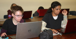 Adults at a technology class at Providence Public Library