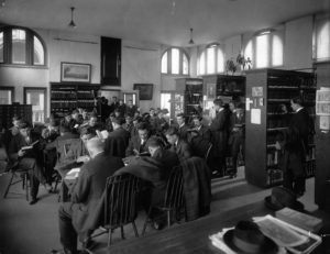 Patrons reading in a reading room