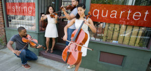 Musicians outside Community Music Works in Providence