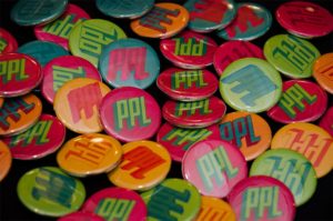 buttons with the Providence Public Library logo on them