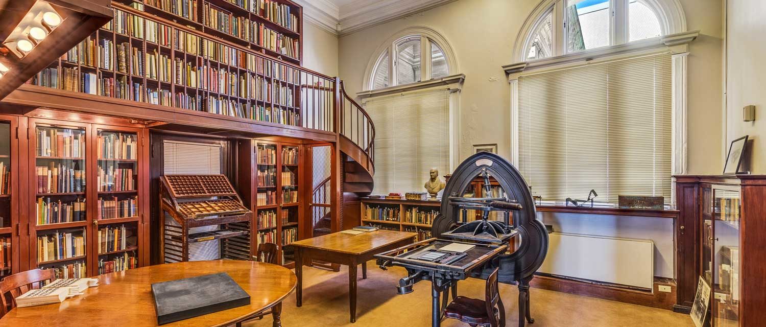 A view of The Updike Collection with a letterpress at Providence Public Library