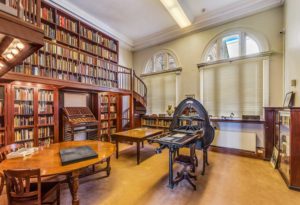 A view of The Updike Collection with a letterpress at Providence Public Library