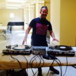 Library Director jack martin DJs at the Rock and Roll Yard Sale at Providence Public library