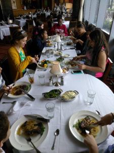 Teen Squad participants dining at the Genesis Center as part of the culinary arts program