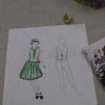 A sketch of a green 1920s flapper style dress