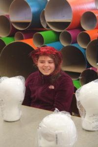 A Teen Squad member wearing a headdress