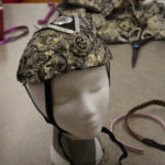 A headdress on a mannequin made as part of the Teen Squad Turbans to Tiaras program