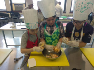 Teen Squad members preparing food