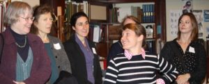 Visitors meet with Special Collections staff member.