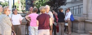 Visitors gather for a Library tour.