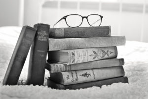 A stack of vintage books