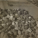 The Dexter Asylum farm land stretched back from Hope Street to Arlington Avenue and over to Angell Street. The land was used to cultivate fruits and vegetables and to house livestock including pigs and dairy cows. The dome of the Central Congregational Church is also visible in this aerial photo. ~ Date: c. 1930-1939