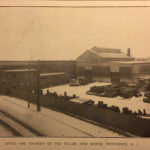 This photograph of the Fuller Iron Works complex was taken from near the intersection of Tockwotton Street and South Main Street. The dramatic expanses of windows provided excellent diffused light within the foundry and iron works. ~ Date: 1902