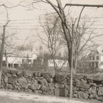 This broad view of the Metcalfs' estate shows some of the numerous outbuildings, which included a barn, chauffeur's cottage, garage, playhouse, stable, and caretaker's house. The stone wall in the foreground remains, although it is no longer topped by formidable chicken wire. ~ Date: c. 1925-1949