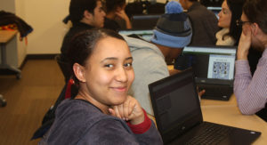 A participant in a PPL Teen Squad Programs smiles at the camera.