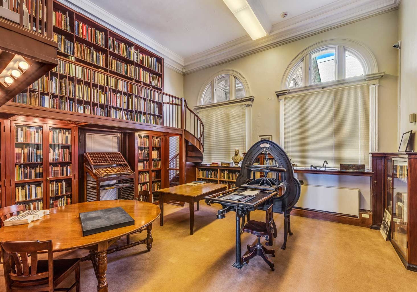 A view of The Updike Collection with a letterpress at Providence Public Library